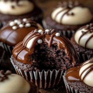 Heavenly Brownie Cupcakes Ingredients: 1 cup 120g all-purpose flour 1/2 cup 60g unsweetened cocoa powder 1/4 teaspoon baking powder 1/4 teaspoon salt 1/2 cup 115g unsalted butter, melted 1 cup 200g granulated sugar 2 large eggs 1 teaspoon vanilla extract 1/2 cup 120ml heavy cream 1/2 cup 120g semi-sweet chocolate chips 1 cup 240ml heavy cream, whipped for topping 1/4 cup 60g chocolate chips, for garnish Additional chocolate chips for garnish Directions: Preheat your oven to 350F 175C and line a muffin tin with cupcake liners. In a medium bowl, whisk together the flour, cocoa powder, baking powder, and salt. In a separate bowl, mix the melted butter and sugar until well combined. Add the eggs one at a time, followed by the vanilla extract. Gradually add the dry ingredients to the wet ingredients, mixing until just combined. Spoon the batter into the cupcake liners, filling each about 2/3 full. Bake for 18-20 minutes, or until a toothpick inserted into the center comes out clean. While the cupcakes are baking, heat 1/2 cup of heavy cream in a small saucepan until just simmering. Remove from heat and stir in the semi-sweet chocolate chips until smooth and glossy. Once the cupcakes are done, let them cool slightly before using a small spoon to create a well in the center of each cupcake. Fill the wells with the prepared chocolate ganache. Top each cupcake with a generous dollop of whipped cream and drizzle with additional melted chocolate. Garnish with a few chocolate chips. Enjoy